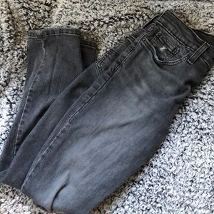 levi jeans, black with rips in knees